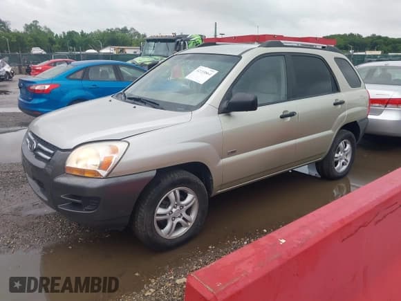 ✅ 2007 Kia Sportage LX • VIN: KNDJE723677332922 • Лот: 42255864. Опубликован ранее на IAAI с пробегом 194 622 миль. Бесплатный доступ к архиву аукционных продаж из США и подробный отчёт об истории автомобиля на DreamBid. Изображение 2.