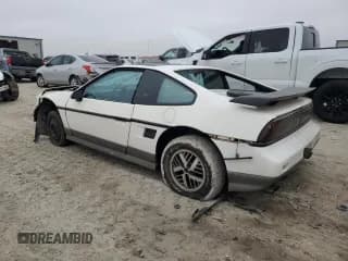✅ 1986 Pontiac Fiero • VIN: 1G2PG9796GP283609 • Lot: 79048574. Wystawiony na Copart z przebiegiem 211 447 mil. Bezpłatny archiwum sprzedaży aukcyjnych z USA i szczegółowy raport historii pojazdu na DreamBid. Zdjęcie 2.