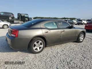 2010 Dodge Charger SXT с VIN 2B3CA3CV4AH202406, выставлен на аукционе Copart как лот 74079124 с пробегом 269 939 миль миль и Списание • Salvage title. История ставок и продаж доступна на DreamBid. Изображение 3.