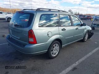 ✅ 2005 Ford Focus SE • VIN: 1FAHP36N65W151003 • Lot: 43624338. Listed on IAAI with 150,971 mi. Free auction sales archive from the USA and detailed vehicle history report at DreamBid. Image 4.