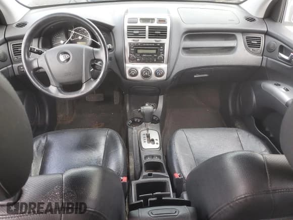 ✅ 2006 Kia Sportage LX • VIN: KNDJE723X67249931 • Лот: 85116395. Опубликован ранее на Copart с пробегом 144 420 миль. Бесплатный доступ к архиву аукционных продаж из США и подробный отчёт об истории автомобиля на DreamBid. Изображение 8.