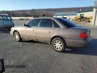 ✅ 1995 Audi A6 • VIN: WAUGA84A2SN055887 • Lot: 85212394. Wystawiony na Copart z przebiegiem 254 307 mil. Bezpłatny archiwum sprzedaży aukcyjnych z USA i szczegółowy raport historii pojazdu na DreamBid. Zdjęcie 2.