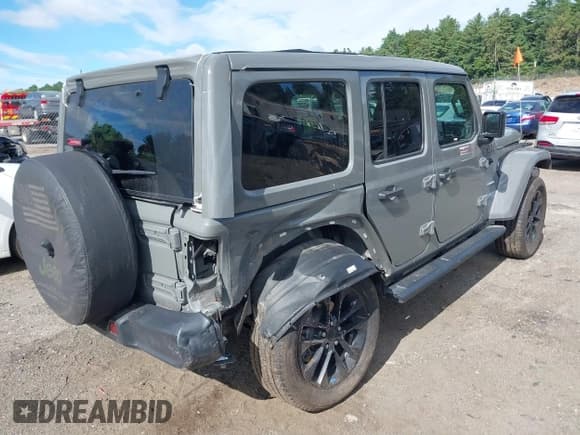 ✅ 2023 Jeep Wrangler Sahara • VIN: 1C4JJXP64PW568165 • Lot: 42740617. Listed on IAAI with 86,559 mi. Free auction sales archive from the USA and detailed vehicle history report at DreamBid. Image 4.