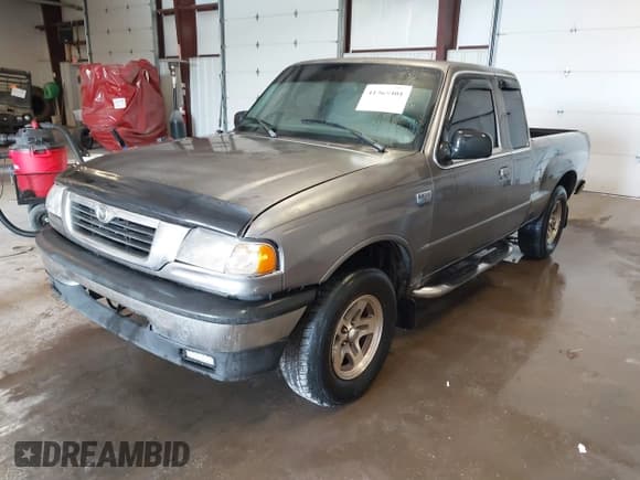 ✅ 2000 Mazda B-Series SE • VIN: 4F4YR16V8YTM09723 • Lot: 41365401. Listed on IAAI with 170,351 mi. Free auction sales archive from the USA and detailed vehicle history report at DreamBid. Image 2.