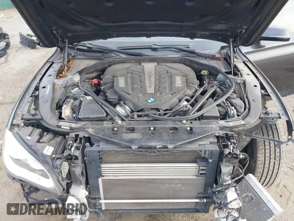 ✅ 2015 BMW 7 Series 750i xDrive • VIN: WBAYB6C56FG299238 • Lot: 41441393. Listed on IAAI with 62,396 mi. Free auction sales archive from the USA and detailed vehicle history report at DreamBid. Image 10.