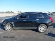 ✅ 2015 Cadillac SRX Luxury Collection • VIN: 3GYFNEE38FS595607 • Lot: 43720579. Listed on IAAI with 103,582 mi. Free auction sales archive from the USA and detailed vehicle history report at DreamBid. Image 15.