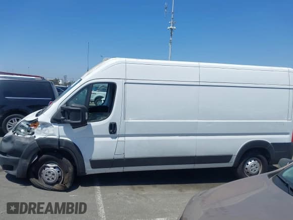 ✅ 2021 Ram ProMaster Cargo • VIN: 3C6LRVDG5ME543131 • Lot: 42826733. Listed on IAAI with 72,243 mi. Free auction sales archive from the USA and detailed vehicle history report at DreamBid. Image 14.