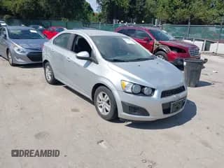 2014 Chevrolet Sonic LT with VIN 1G1JC5SH4E4176165, listed as a IAAI auction lot 43124779 with 101,869 mi miles and . Bid and sale history available at DreamBid. Image 1.
