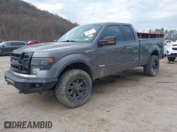 ✅ 2014 Ford F-150 XL • VIN: 1FTFX1ETXEFC89777 • Lot: 41897673. Listed on IAAI with 140,125 mi. Free auction sales archive from the USA and detailed vehicle history report at DreamBid. Image 2.