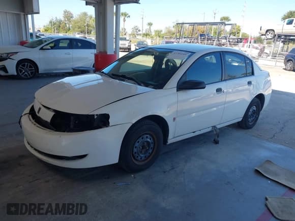 ✅ 2004 Saturn ION ION 1 • VIN: 1G8AG52F34Z189706 • Lot: 43704201. Listed on IAAI with 255,209 mi. Free auction sales archive from the USA and detailed vehicle history report at DreamBid. Image 2.