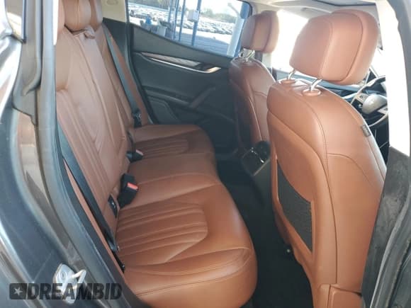 ✅ 2015 Maserati Ghibli • VIN: ZAM57XSA8F1134852 • Лот: 85680555. Опубликован ранее на Copart с пробегом 99 209 миль. Бесплатный доступ к архиву аукционных продаж из США и подробный отчёт об истории автомобиля на DreamBid. Изображение 10.