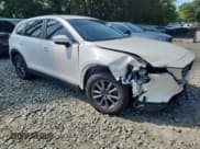✅ 2022 Mazda CX-9 Sport • VIN: JM3TCBBY9N0606317 • Лот: 66831945. Опубликован ранее на Copart с пробегом 60 011 миль. Бесплатный доступ к архиву аукционных продаж из США и подробный отчёт об истории автомобиля на DreamBid. Изображение 4.