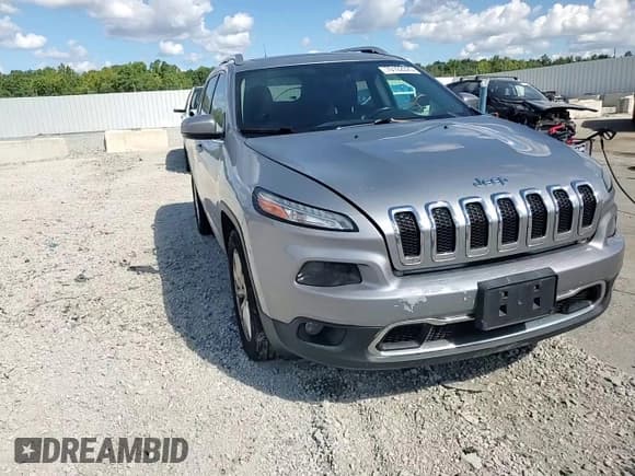 ✅ 2016 Jeep Cherokee Limited • VIN: 1C4PJMDB5GW163992 • Lot: 70102025. Listed on Copart with 164,533 mi. Free auction sales archive from the USA and detailed vehicle history report at DreamBid. Image 14.