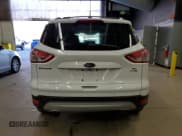 ✅ 2016 Ford Escape SE • VIN: 1FMCU9GX0GUC03106 • Lot: 90696925. Listed on Copart with 113,684 mi. Free auction sales archive from the USA and detailed vehicle history report at DreamBid. Image 6.