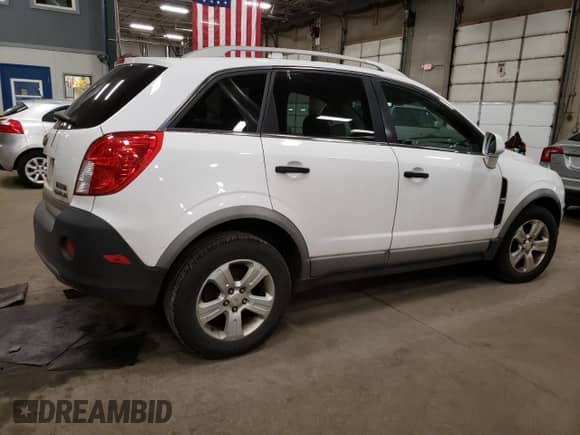 2014 Chevrolet Captiva Sport LS with VIN 3GNAL2EK6ES626922, listed as a Copart auction lot 53092604 with 100,690 mi miles and Non repairable. Bid and sale history available at DreamBid. Image 3.