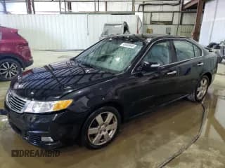 ✅ 2009 Kia Optima SX • VIN: KNAGE224395308465 • Lot: 45403645. Wystawiony na Copart z przebiegiem 75 402 mil. Bezpłatny archiwum sprzedaży aukcyjnych z USA i szczegółowy raport historii pojazdu na DreamBid. Zdjęcie 1.