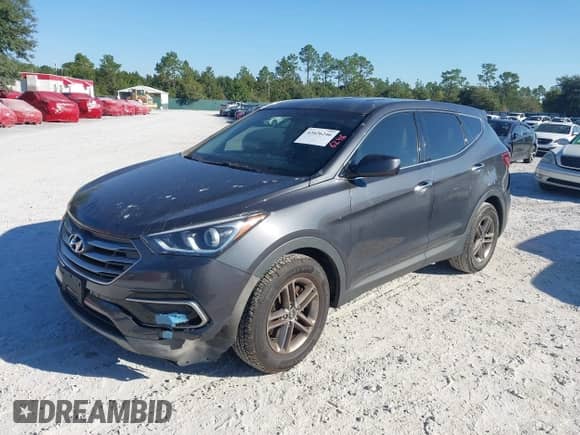 2017 Hyundai Santa Fe 2.4L z VIN 5XYZTDLB1HG468229, wystawiony jako IAAI lot #43426246 z przebiegiem 282 283 mil mil oraz . Historia ofert i sprzedaży dostępna na DreamBid. Obrazek 2.