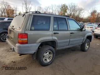 ✅ 1997 Jeep Grand Cherokee Laredo • VIN: 1J4GZ58S1VC741586 • Лот: 77619394. Опубликован ранее на Copart с пробегом Не указан. Бесплатный доступ к архиву аукционных продаж из США и подробный отчёт об истории автомобиля на DreamBid. Изображение 3.