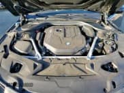 ✅ 2022 BMW 8 Series 840i • VIN: WBAGV2C00NCJ26417 • Лот: 89922235. Опубликован ранее на Copart с пробегом 29 980 миль. Бесплатный доступ к архиву аукционных продаж из США и подробный отчёт об истории автомобиля на DreamBid. Изображение 13.