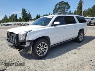 ✅ 2020 GMC Yukon XL Denali • VIN: 1GKS2HKJ2LR233910 • Lot: 60494915. Wystawiony na Copart z przebiegiem 69 985 mil. Bezpłatny archiwum sprzedaży aukcyjnych z USA i szczegółowy raport historii pojazdu na DreamBid. Zdjęcie 1.