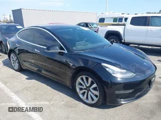 ✅ 2018 Tesla Model 3 Long Range Battery • VIN: 5YJ3E1EB7JF186668 • Lot: 42765788. Listed on IAAI with 151,321 mi. Free auction sales archive from the USA and detailed vehicle history report at DreamBid. Image 1.