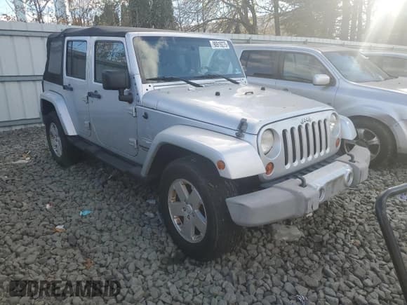 ✅ 2010 Jeep Wrangler Unlimited Sahara • VIN: 1J4HA5H12AL185172 • Lot: 90919275. Wystawiony na Copart z przebiegiem 230 887 mil. Bezpłatny archiwum sprzedaży aukcyjnych z USA i szczegółowy raport historii pojazdu na DreamBid. Zdjęcie 4.