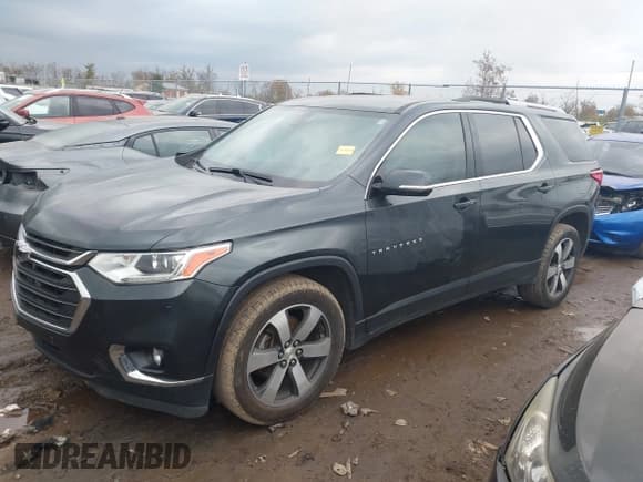 ✅ 2018 Chevrolet Traverse LT • VIN: 1GNEVHKW6JJ174682 • Lot: 43571283. Wystawiony na IAAI z przebiegiem 143 203 mil. Bezpłatny archiwum sprzedaży aukcyjnych z USA i szczegółowy raport historii pojazdu na DreamBid. Zdjęcie 2.
