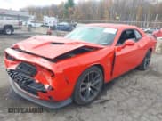 ✅ 2016 Dodge Challenger R/T Scat Pack • VIN: 2C3CDZFJ7GH344327 • Lot: 43489730. Listed on IAAI with 57,033 mi. Free auction sales archive from the USA and detailed vehicle history report at DreamBid. Image 2.