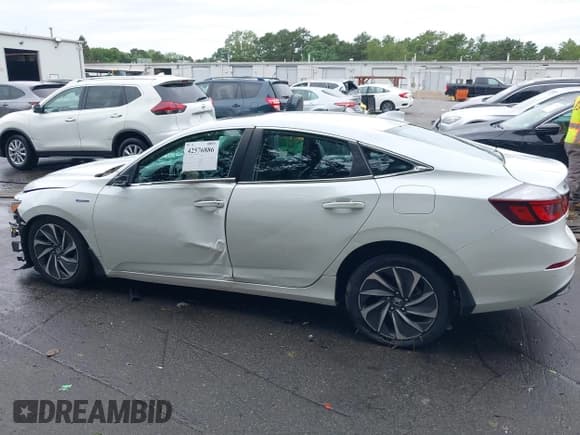 ✅ 2020 Honda Insight Touring • VIN: 19XZE4F96LE004376 • Lot: 42576886. Listed on IAAI with 60,566 mi. Free auction sales archive from the USA and detailed vehicle history report at DreamBid. Image 14.