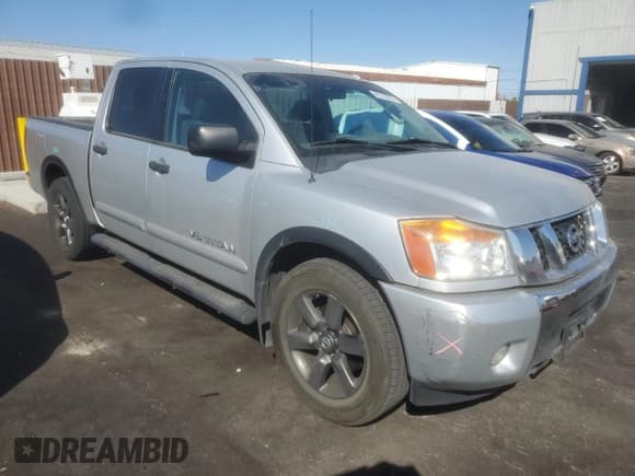 ✅ 2015 Nissan Titan SL • VIN: 1N6BA0ED9FN510261 • Lot: 81218235. Listed on Copart with 108,497 mi. Free auction sales archive from the USA and detailed vehicle history report at DreamBid. Image 4.