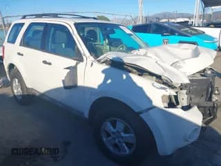 ✅ 2010 Ford Escape XLS • VIN: 1FMCU0C79AKC64216 • Lot: 43841078. Listed on IAAI with Not provided. Free auction sales archive from the USA and detailed vehicle history report at DreamBid. Image 1.