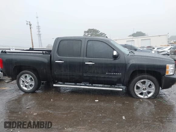 ✅ 2012 Chevrolet Silverado 1500 LTZ • VIN: 3GCPCTE0XCG229964 • Lot: 41476181. Wystawiony na IAAI z przebiegiem 217 334 mil. Bezpłatny archiwum sprzedaży aukcyjnych z USA i szczegółowy raport historii pojazdu na DreamBid. Zdjęcie 13.