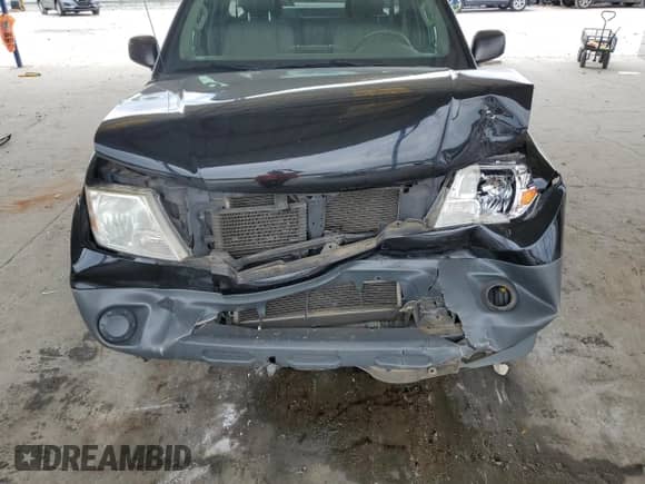 2015 Nissan Frontier S z VIN 1N6BD0CTXFN703634, wystawiony jako Copart lot #81787225 z przebiegiem 247 511 mil mil oraz Szkoda całkowita • Salvage title. Historia ofert i sprzedaży dostępna na DreamBid. Obrazek 11.