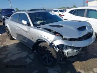 2022 Dodge Charger SRT Hellcat Widebody z VIN 2C3CDXL91NH187423, wystawiony jako IAAI lot #42264919 z przebiegiem 16 081 mil mil oraz . Historia ofert i sprzedaży dostępna na DreamBid. Obrazek 1.