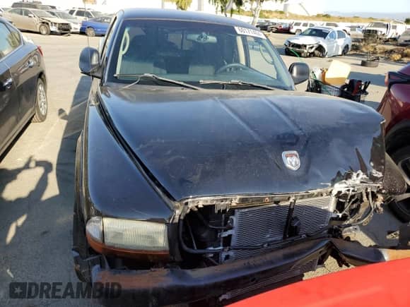 2001 Dodge Dakota Sport z VIN 1B7GL22Z01S315190, wystawiony jako Copart lot #60171404 z przebiegiem 145 397 mil mil oraz Nie do naprawy • Non repairable. Historia ofert i sprzedaży dostępna na DreamBid. Obrazek 5.