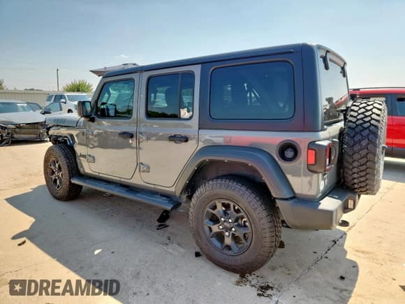 ✅ 2023 Jeep Wrangler Willys • VIN: 1C4HJXDNXPW522558 • Lot: 67774175. Listed on Copart with 40,465 mi. Free auction sales archive from the USA and detailed vehicle history report at DreamBid. Image 2.