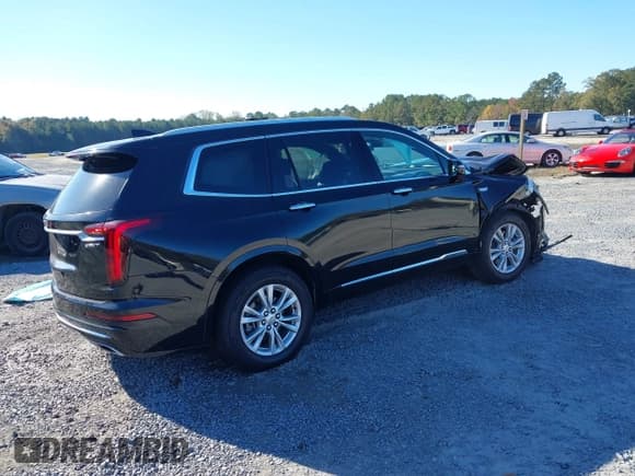 ✅ 2023 Cadillac XT6 FWD Luxury • VIN: 1GYKPAR46PZ120241 • Lot: 43678995. Listed on IAAI with 63,617 mi. Free auction sales archive from the USA and detailed vehicle history report at DreamBid. Image 4.