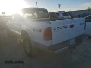 2004 Dodge Dakota SLT z VIN 1D7HG48N24S597531, wystawiony jako Copart lot #75362604 z przebiegiem 147 191 mil mil oraz Szkoda całkowita • Salvage title. Historia ofert i sprzedaży dostępna na DreamBid. Obrazek 2.
