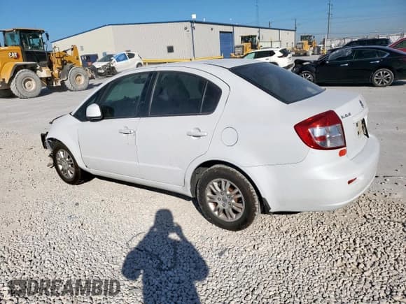 ✅ 2012 Suzuki SX4 LE • VIN: JS2YC5A37C6303297 • Lot: 91703025. Wystawiony na Copart z przebiegiem 113 870 mil. Bezpłatny archiwum sprzedaży aukcyjnych z USA i szczegółowy raport historii pojazdu na DreamBid. Zdjęcie 2.