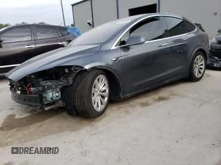 ✅ 2017 Tesla Model X 90D • VIN: 5YJXCAE20HF051985 • Lot: 47794673. Listed on Copart with 27,409 mi. Free auction sales archive from the USA and detailed vehicle history report at DreamBid. Image 1.