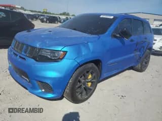 ✅ 2018 Jeep Grand Cherokee • VIN: NCS106058 • Lot: 58186895. Listed on Copart with 94,614 mi. Free auction sales archive from the USA and detailed vehicle history report at DreamBid. Image 1.