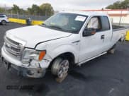 ✅ 2014 Ford F-150 XL • VIN: 1FTFX1CF1EKE23998 • Lot: 43449945. Listed on IAAI with 157,356 mi. Free auction sales archive from the USA and detailed vehicle history report at DreamBid. Image 2.