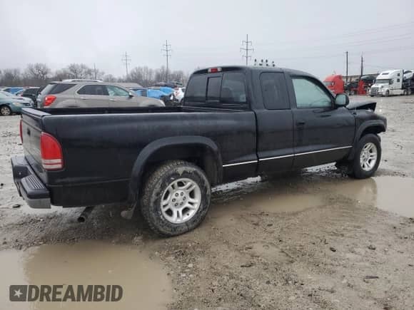 2004 Dodge Dakota Sport z VIN 1D7GL32N34S708694, wystawiony jako Copart lot #85050064 z przebiegiem Nie podano mil oraz Szkoda całkowita • Salvage title. Historia ofert i sprzedaży dostępna na DreamBid. Obrazek 3.