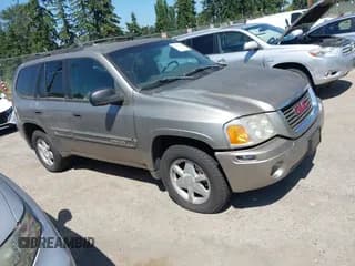 ✅ 2002 GMC Envoy SLT • VIN: 1GKDT13S822451278 • Lot: 42753968. Listed on IAAI with 108,809 mi. Free auction sales archive from the USA and detailed vehicle history report at DreamBid. Image 1.