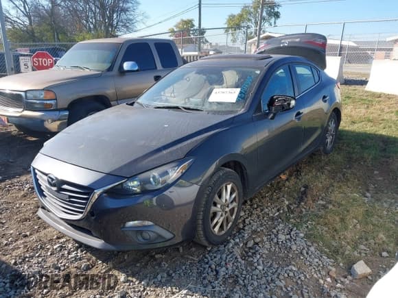 ✅ 2016 Mazda 3 i Touring • VIN: 3MZBM1V75GM243798 • Lot: 43707365. Listed on IAAI with 156,926 mi. Free auction sales archive from the USA and detailed vehicle history report at DreamBid. Image 2.