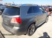 ✅ 2012 Kia Sorento SX • VIN: 5XYKW4A25CG199978 • Lot: 43832286. Listed on IAAI with 235,064 mi. Free auction sales archive from the USA and detailed vehicle history report at DreamBid. Image 4.