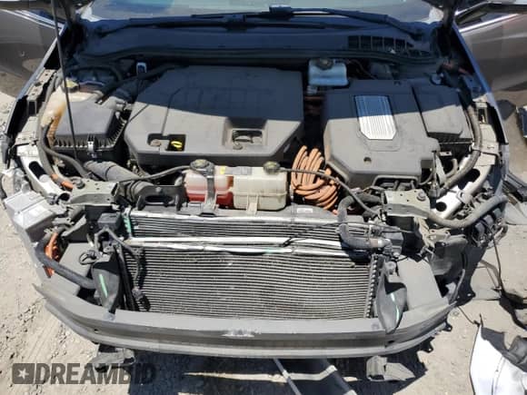 2014 Chevrolet Volt z VIN 1G1RE6E46EU150145, wystawiony jako Copart lot #60349254 z przebiegiem 122 293 mil mil oraz Szkoda całkowita • Salvage title. Historia ofert i sprzedaży dostępna na DreamBid. Obrazek 11.