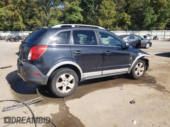 2014 Chevrolet Captiva Sport LS with VIN 3GNAL2EK7ES620708, listed as a Copart auction lot 76695854 with 162,694 mi miles and Salvage title. Bid and sale history available at DreamBid. Image 3.