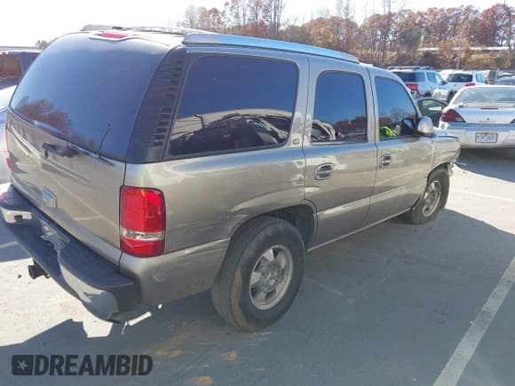 ✅ 2002 Chevrolet Tahoe LS • VIN: 1GNEC13Z42R243992 • Lot: 43706507. Listed on IAAI with 245,208 mi. Free auction sales archive from the USA and detailed vehicle history report at DreamBid. Image 4.