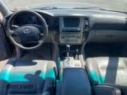 ✅ 2004 Toyota Land Cruiser • VIN: JTEHT05J542063838 • Lot: 61601835. Listed on Copart with 290,726 mi. Free auction sales archive from the USA and detailed vehicle history report at DreamBid. Image 9.